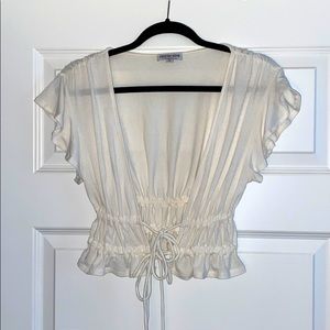 Cinched waistline front tie top